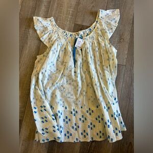 Free People oversized cream with blue accents top. NWT